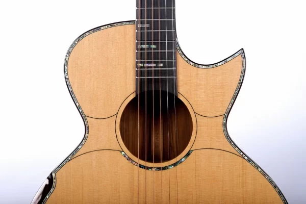 38 inches solid spruce top acoustic guitar abalone inlays rosewood back and sides